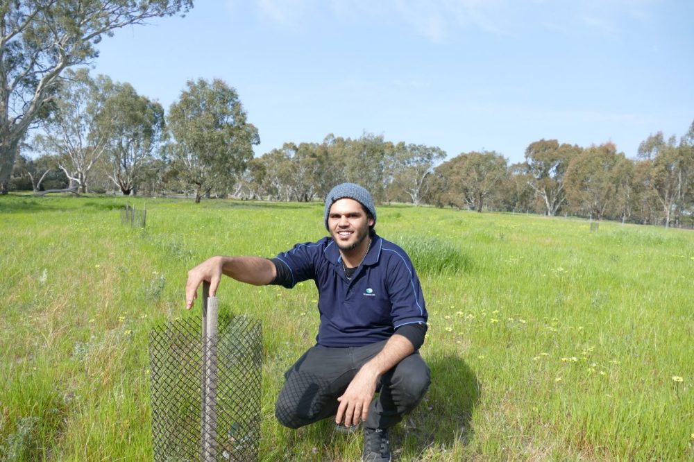 CMA trainee Tyson Secombe inspects revegetation