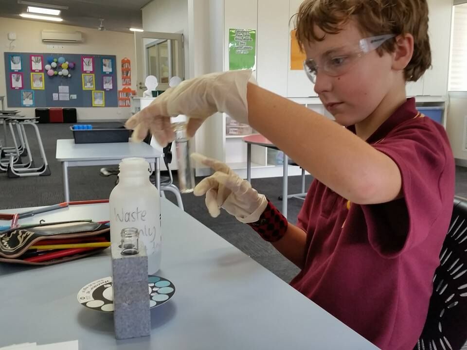 Goornong Primary School student tests for phosphorus, with water from the Campaspe River